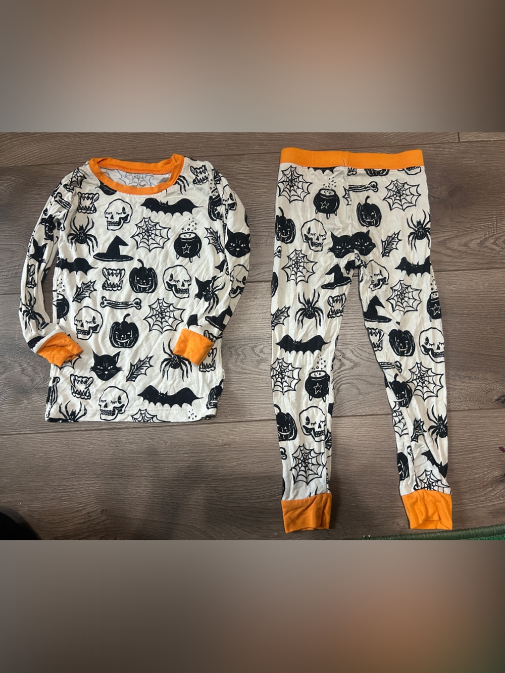 Little Sleepies Cream and Orange Halloween Pajama Set with Black Motifs